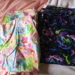 2 Scrub Tops(Medium & Large) sold together